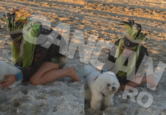 Delia a pupat un câine în bot.