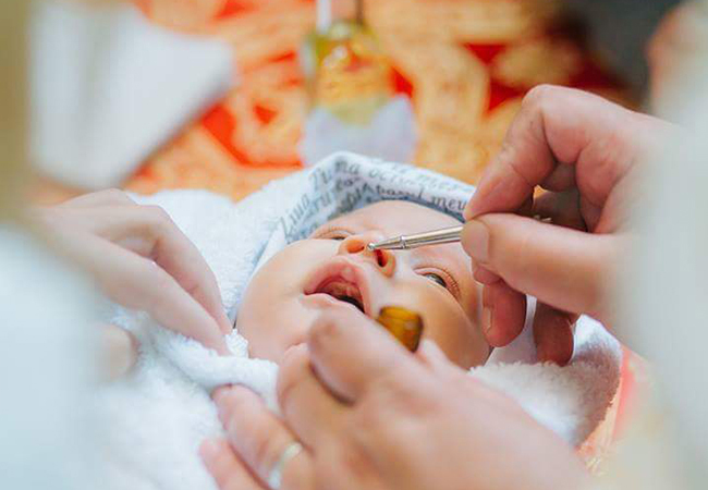 Adina Bourceanu şi soţul ei au fost naşi de botez.