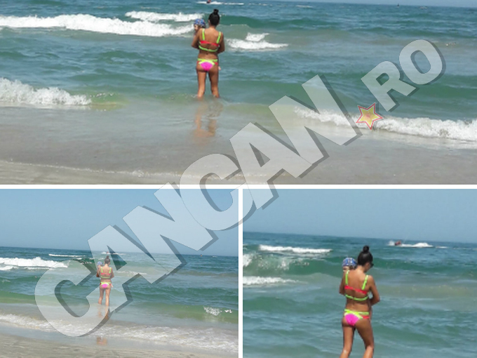 EBA a intrat în mare cu micuţul ei în braţe. 