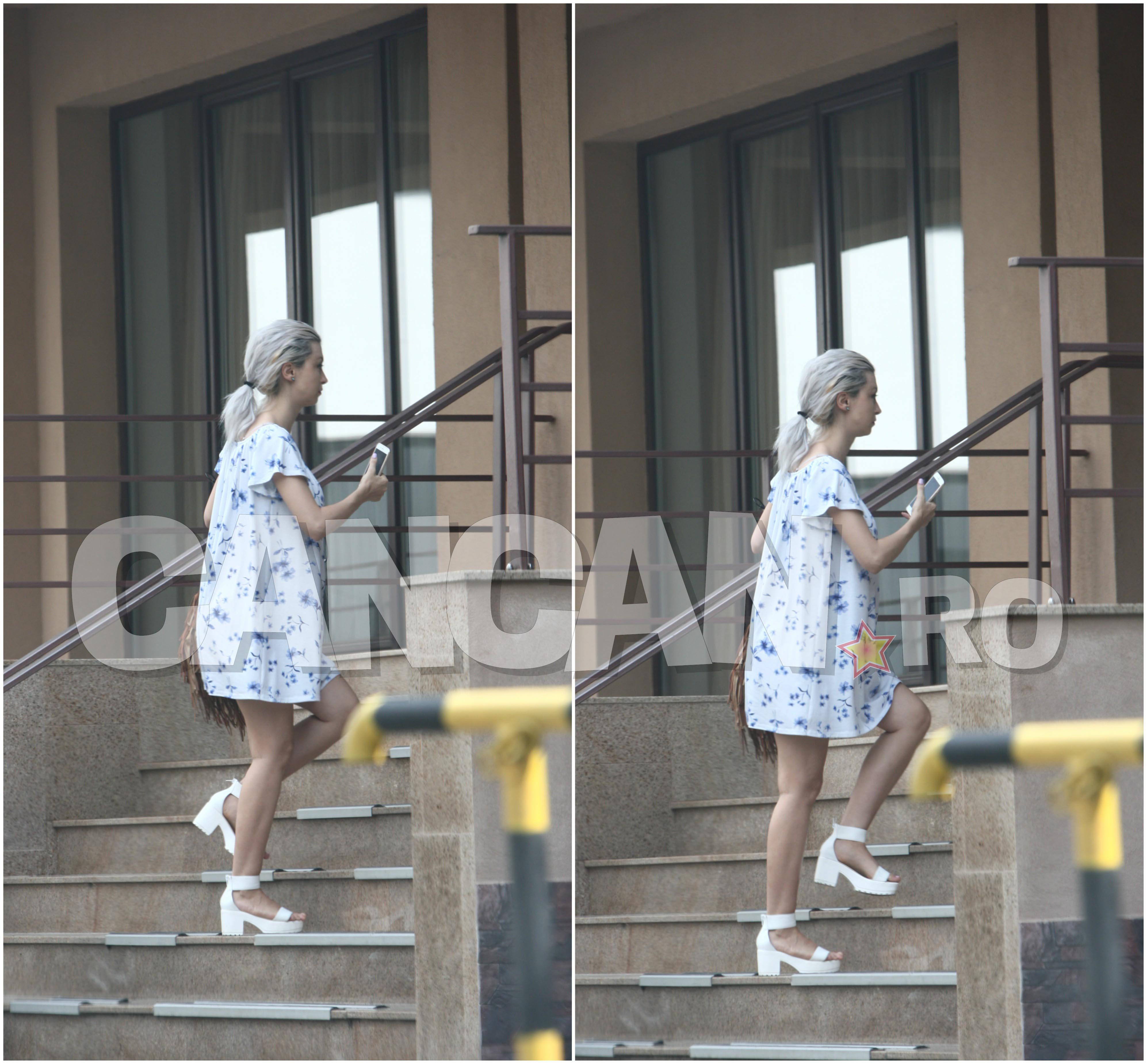 Burtica Andreei este mai mult decât evidentă, dar cântăreaţa nu se poate abţine nici de la cântat, nici de la purtat tocuri! Însă, a luat totuşi o pauză de la coafor şi machiaj.