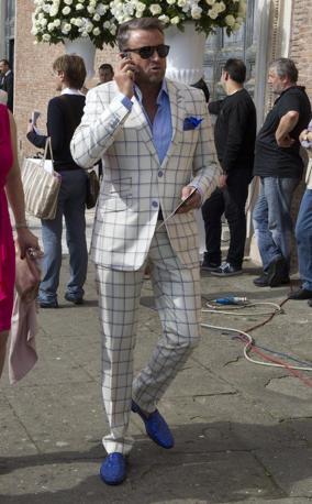 Senzatia evenimentului au reprezentat-o pantofii de 8.000 de euro pe care i-a purtat Botezatu la biserica