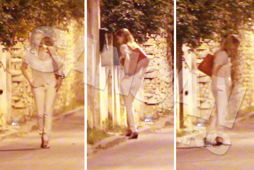 Asteptand ca Radu sa parcheze masina, blonda s-a mangaiat provocator in strada ca intr-un veritabil joc erotic