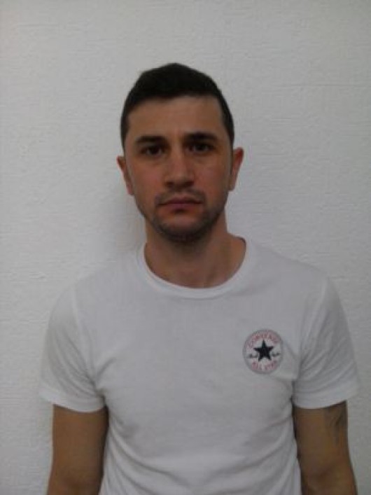 Claudiu Raducanu, fotografiat in arestul politiei