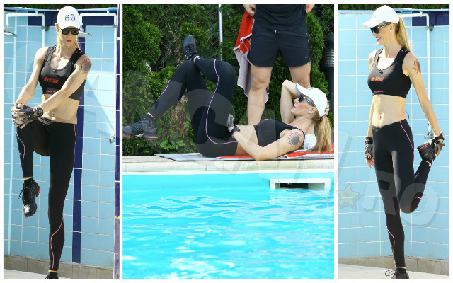 Vedeta îşi face excerciţiile la piscină, antrenându-şi abdomenul şi picioarele.