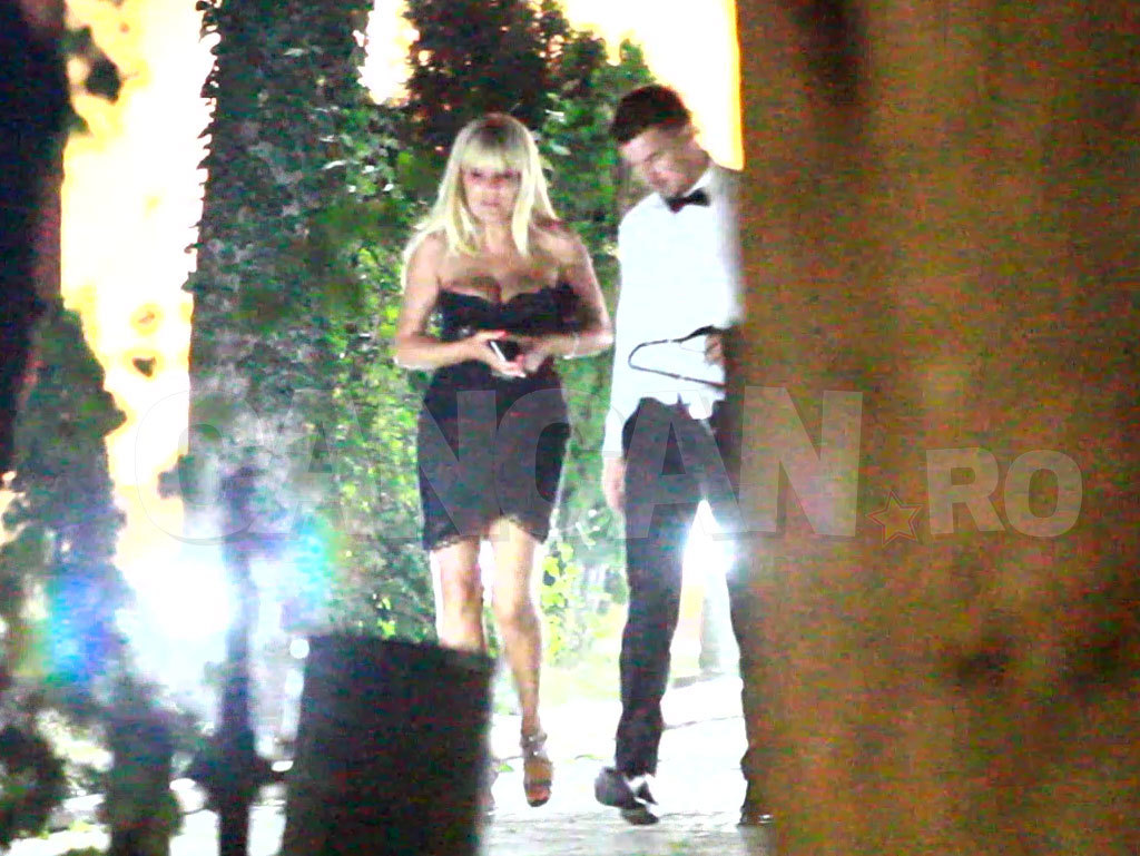 Cei doi îndrăgostiti au mers pe alee, până la maşină