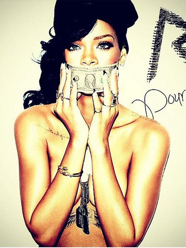 Este oficial! Rihanna se sărută cu Chris Brown: