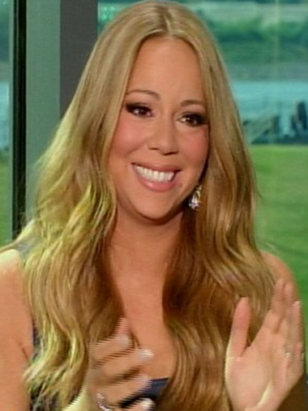 Un concurent a dat-o pe spate pe Mariah Carey, la preselecţiile American Idol: