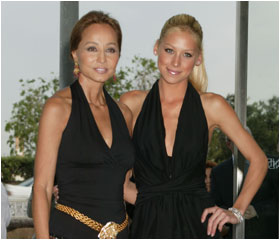 Alături de Anna Kournikova, iubita lui Enrigue.