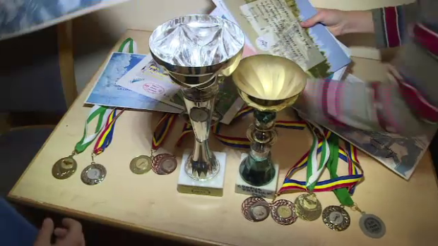 Cei trei orfani au o multime de cupe si premii, find campioni nationali la biatlon