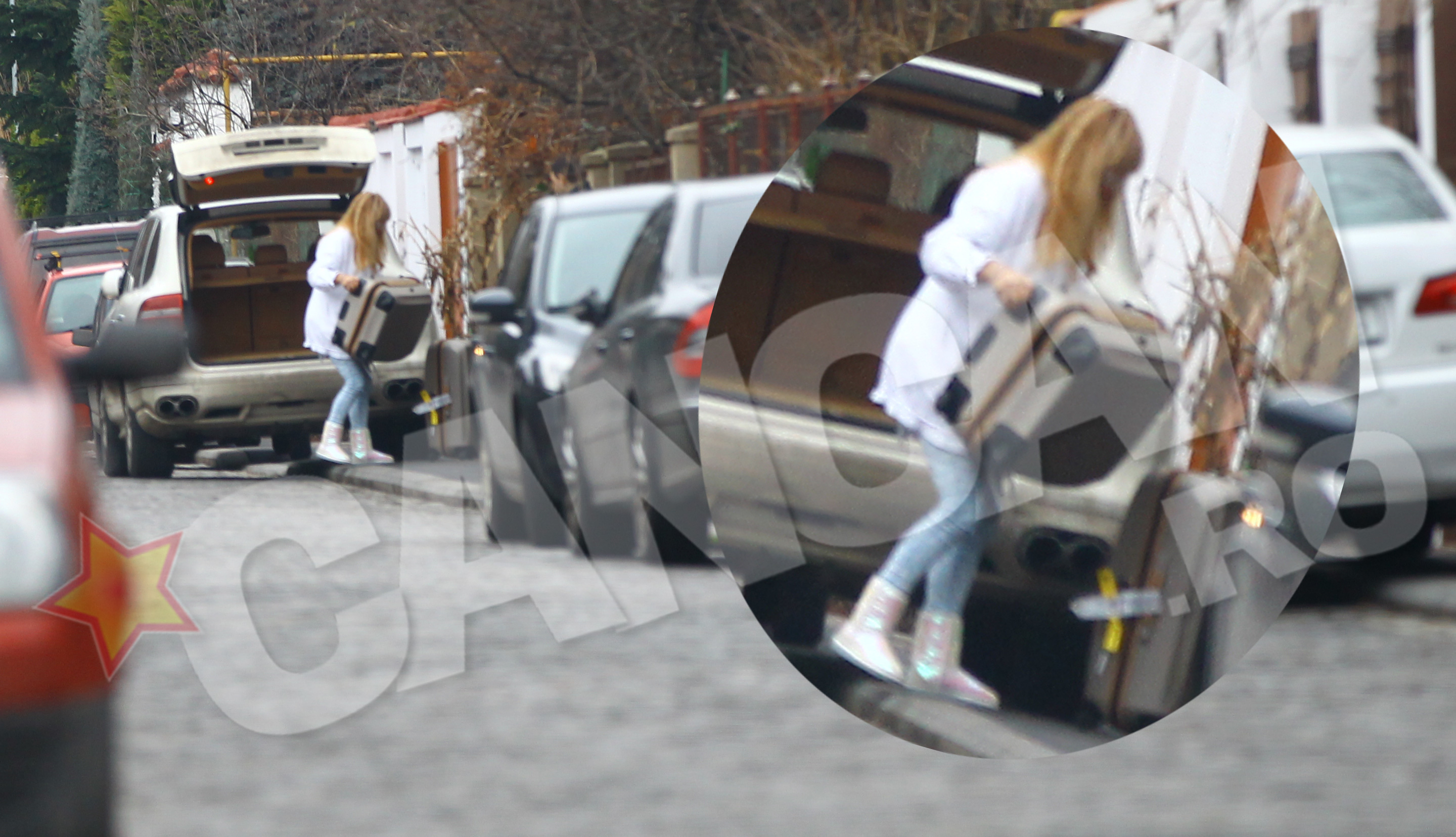 Dana Patriciu se chinuie singura sa descarce bagajele din portbagaj