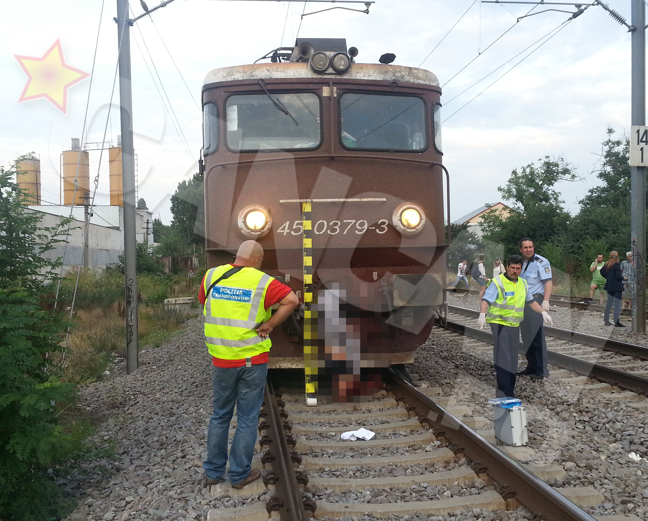 Cadavrul a ramas agatar de cuiul locomotivei