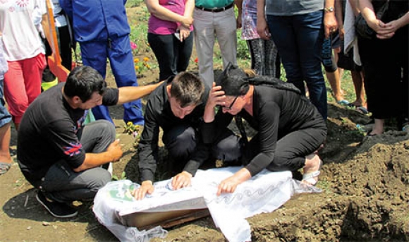 La inmormantarea micutului.