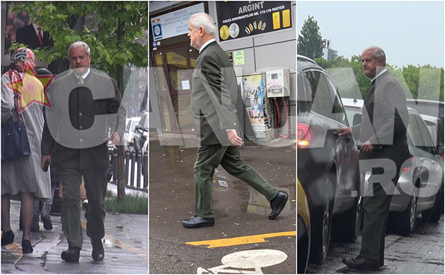 Adrian Năstase pleacă grăbit spre maşină, ignorând ploaia de afară.