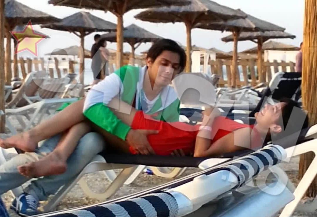 Carmin a inceput sa o pipaie indraznet pe tanara cu care se tolanise pe sezlong