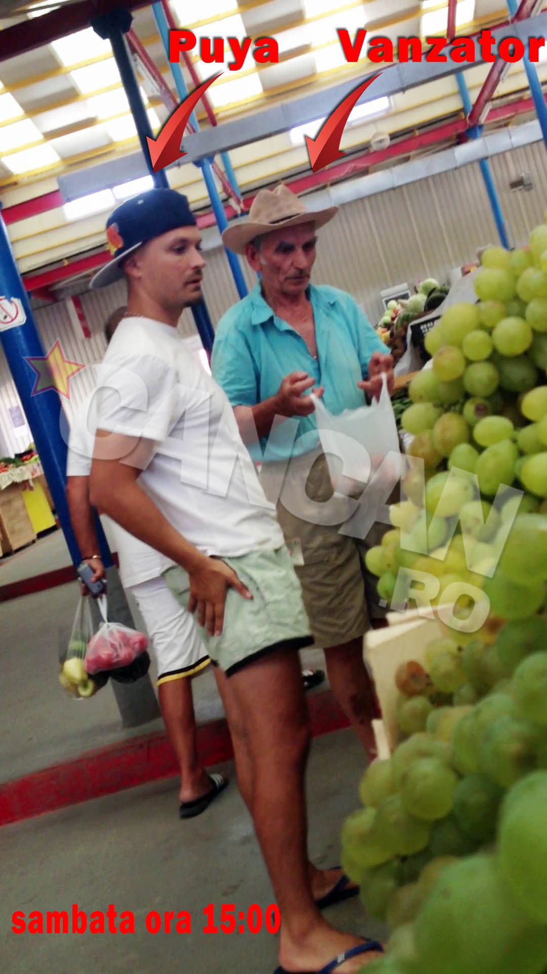 Puya analizeaza din ochi oferta de pe taraba si ii indica vanzatorului ce vrea sa cumpere