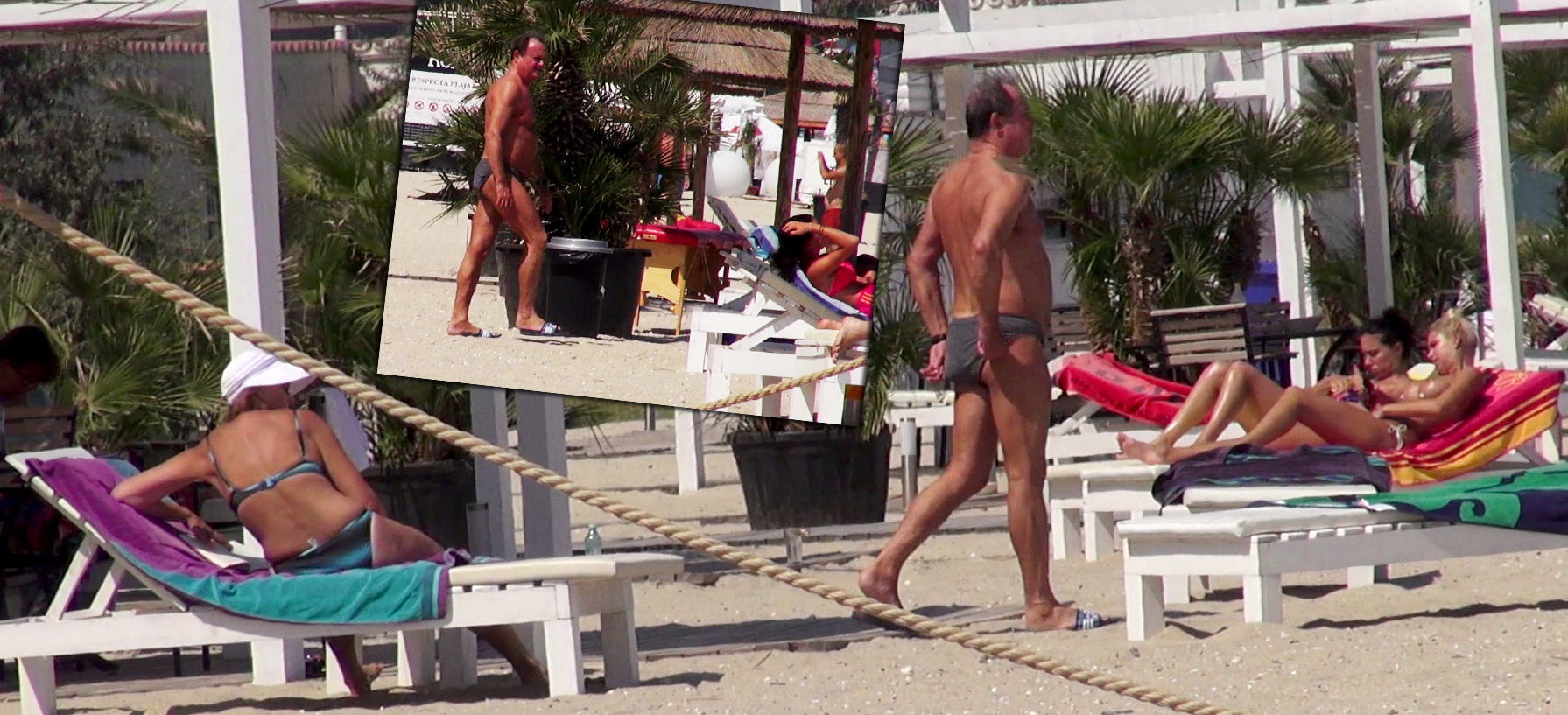 Doamna Blaga nu-si scapa sotul nicio secunda din ochi, in timp ce politicianul mai arunca priviri si catre alte sezlonguri