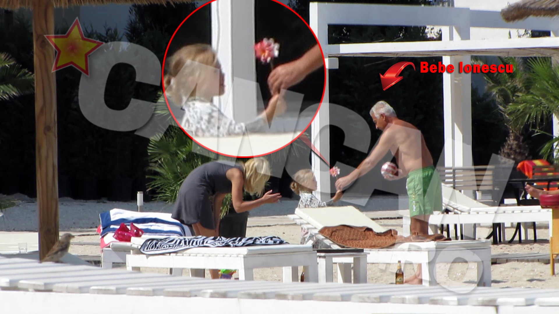 Accesorizat cu o minge si un zambet larg pe buze, cuscrul lui Basescu a incercat de zor sa intre in gratiile fetitei de cativa anisori.