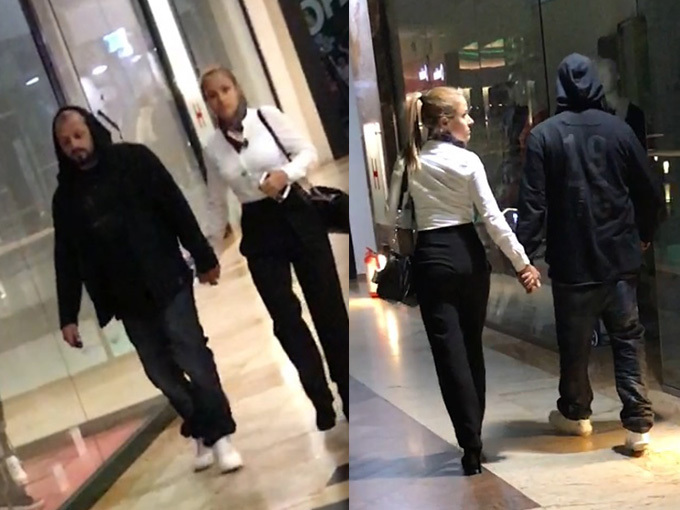 Ombladon îşi ţine iubita de mână în mall, fiind un bărbat atent.