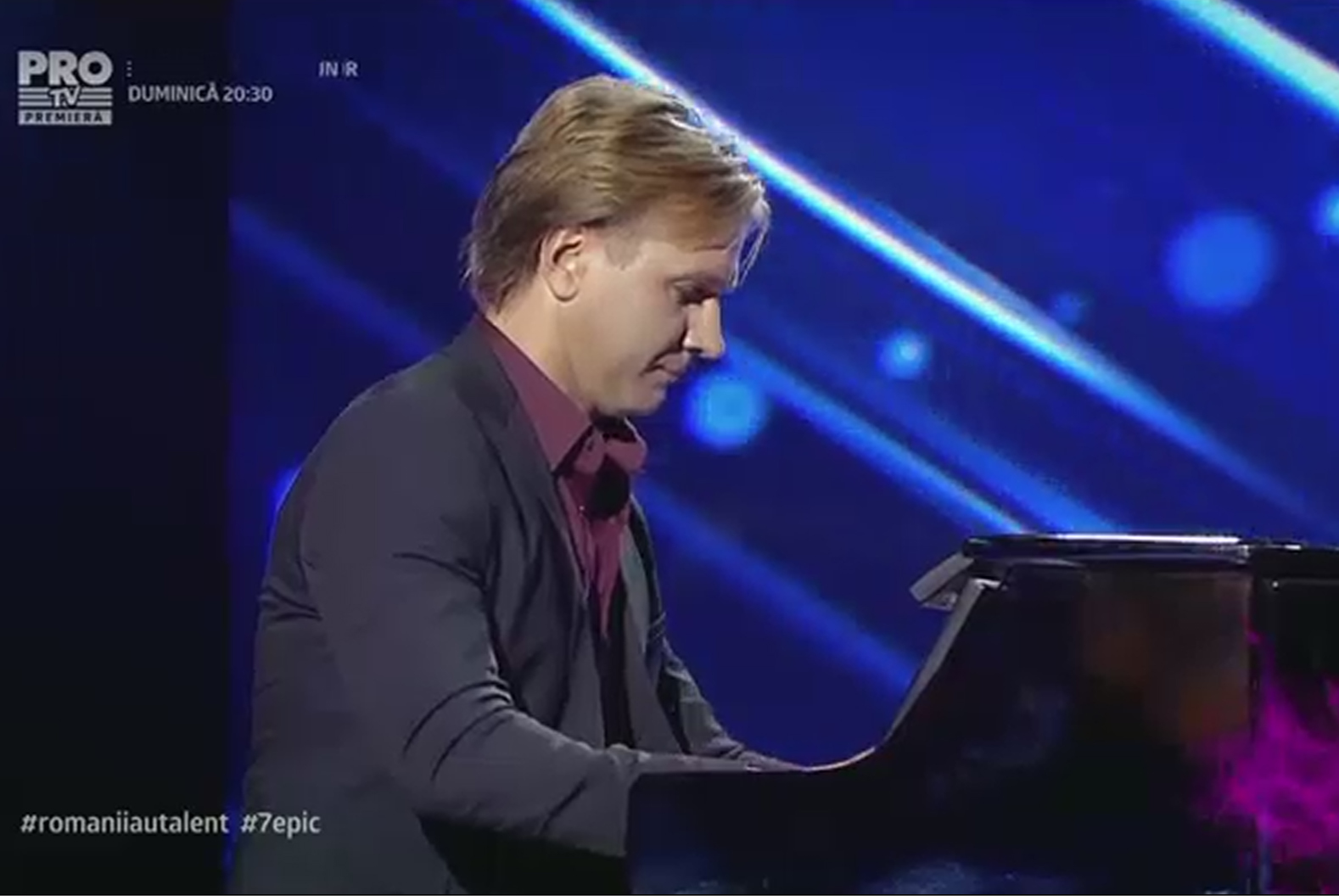  Dima Belinski (44 ani) este de profesie muzician