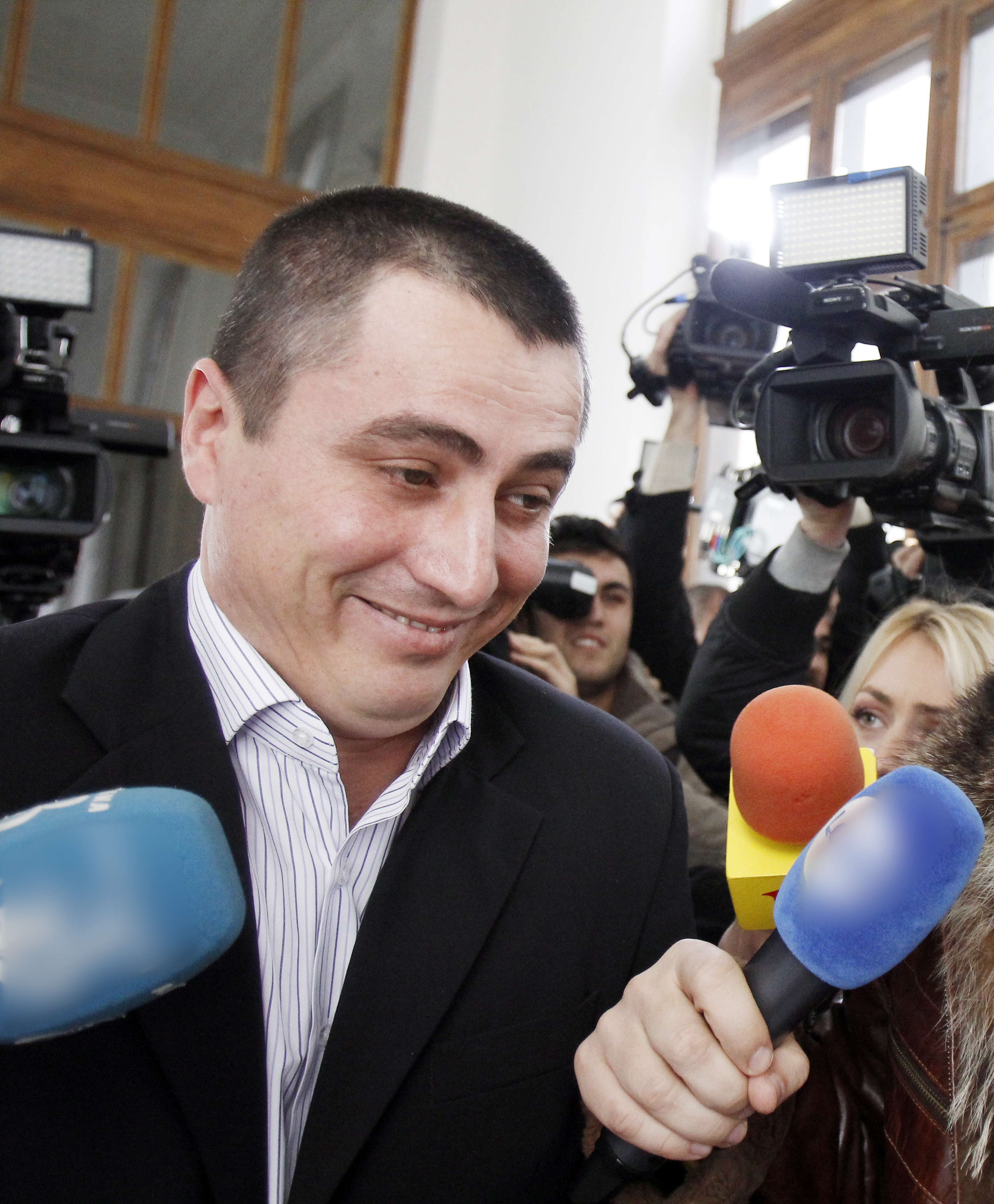 Politistul era zambitor in momentul in care a iesit din sala de judecata