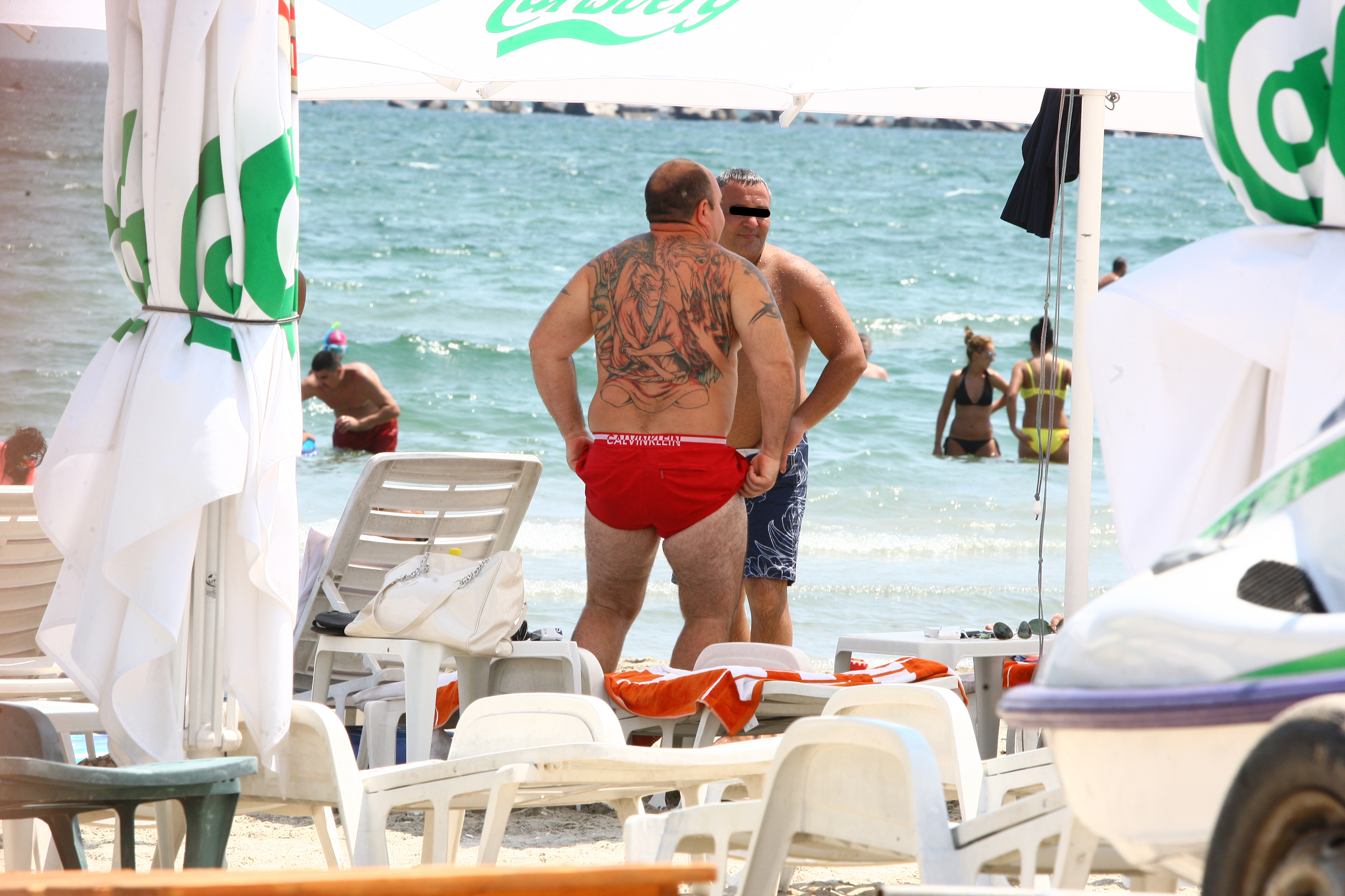 Nutu Camataru are pe spate un tatuaj impresionant