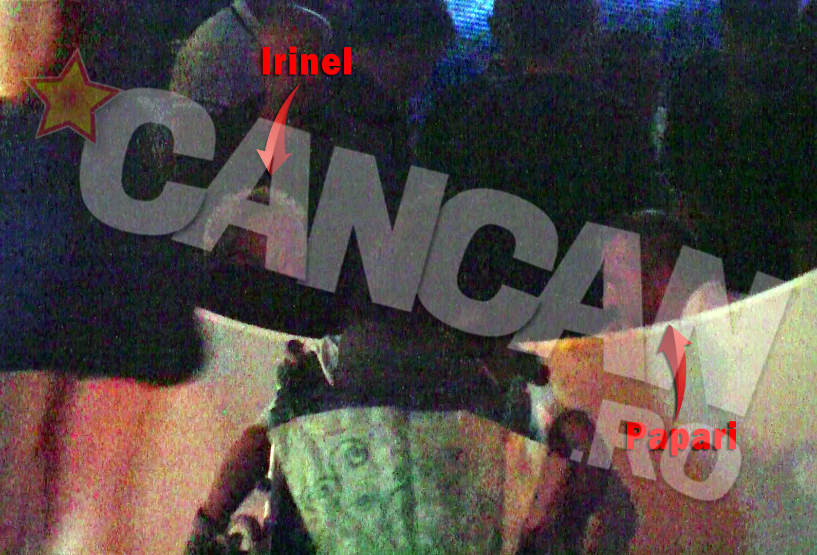 Irinel si prietenul sau, George Papari, continuau sa manace, ingornad-o pe cersetoare