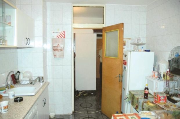 În acest apartament şi-a omorât şi tranşat criminalul victima