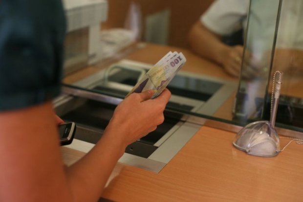 Ce somație a primit o femeie din Baia Mare de la banca. Suma pe care trebuie să o plătească e de necrezut