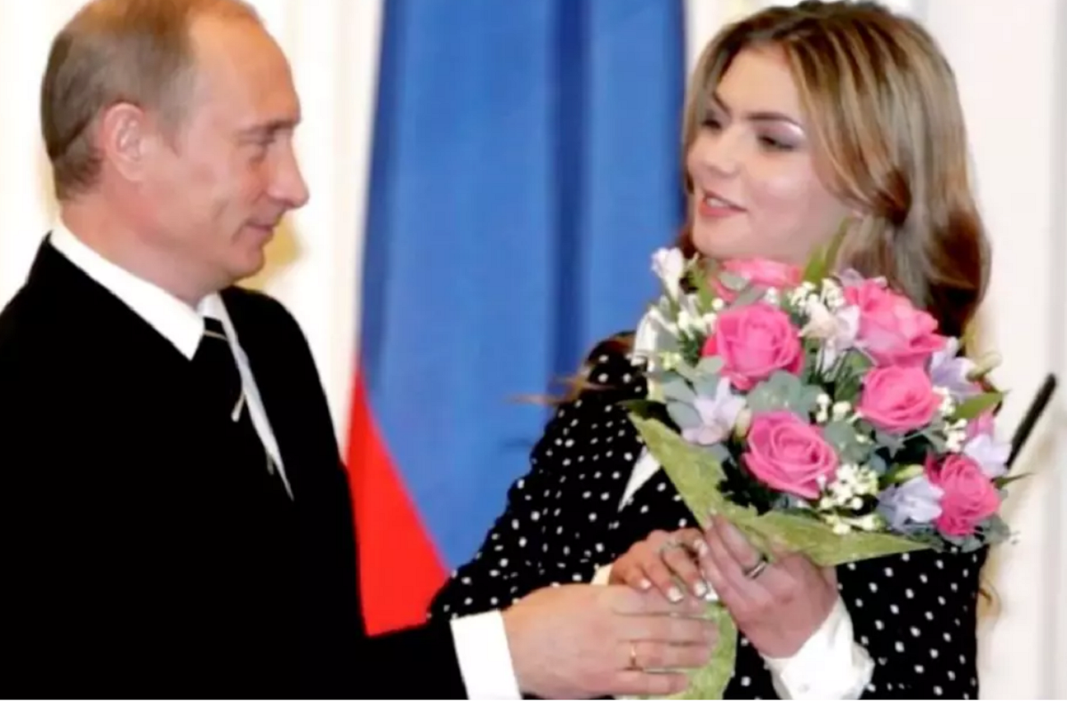 Imagine Stire Cine este, de fapt, presupusa iubita a lui Vladimi Putin? Este cu 31 de ani mai tânără | 2review.ro
