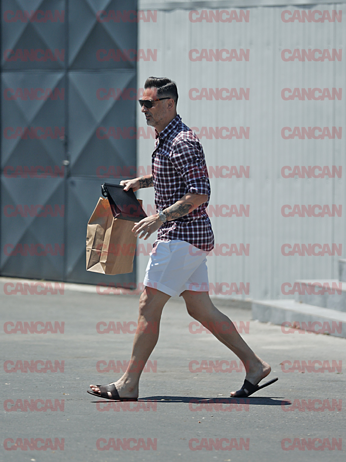 Ținuta fostului antrenor însuma și ea zeci de mii de euro Foto CANCAN.RO